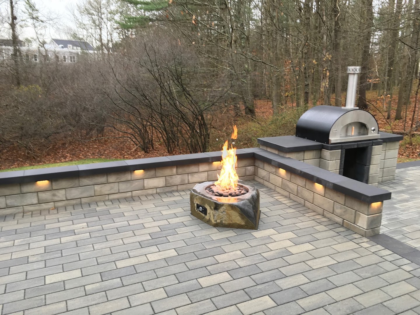 Firepit + pizza oven at dusk